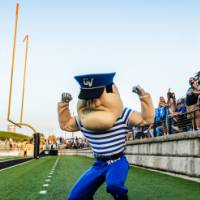 Louie poses for a photo at Lubbers Stadium
